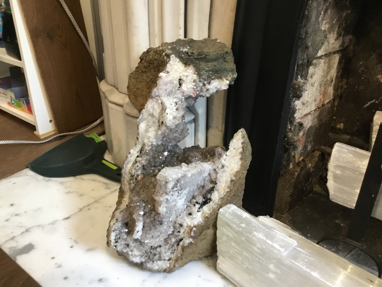 Large rough amethyst on floor